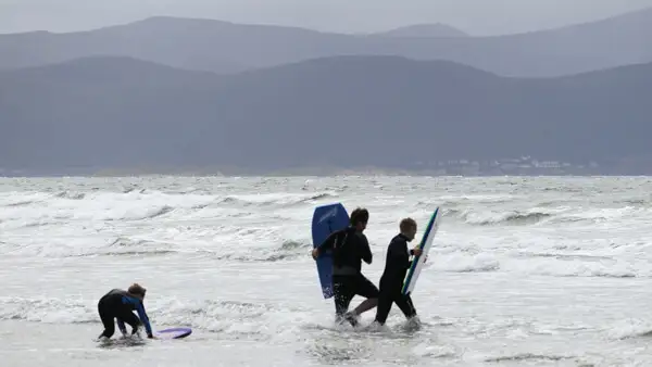 Surfers at Inch Beach