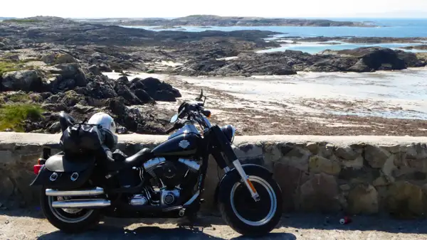 Motorbike at the secluded coastline of Connemara