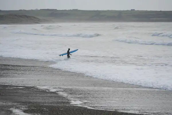 Surfer at Tramore Beach