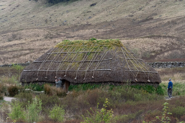 Visitors at the Turf House at Glencoe Visitor Centre