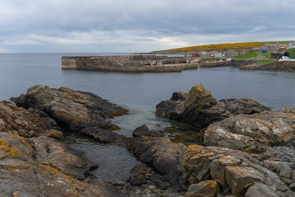 View from cliffs to Portsoy harbour
