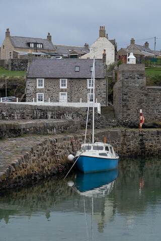 Sail boat at Portsoy old harbour