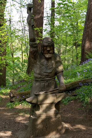Wooden sculpture in the forest at Wallace Monument