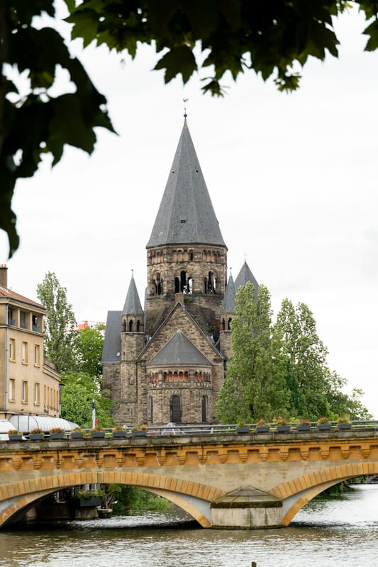 Riverside view of Temple Neuf
